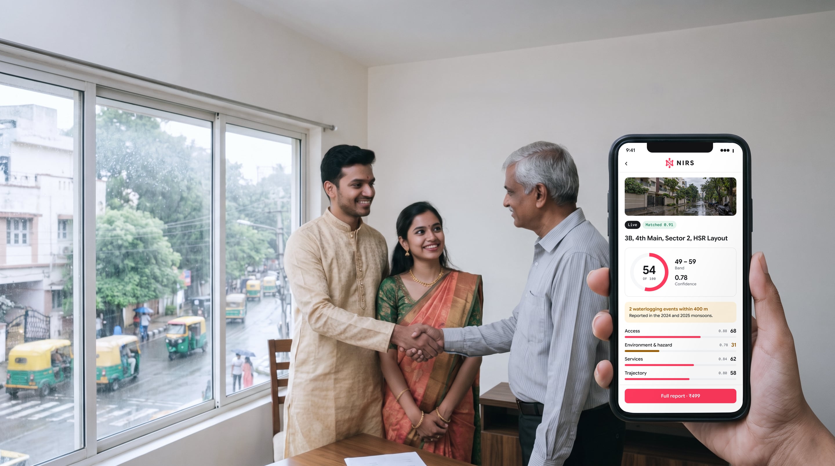 A young couple and an older man shake hands over a property deal in a bright room above a rainy street, while a hand in the foreground holds a phone showing the NIRS score for 3B, 4th Main, Sector 2, HSR Layout